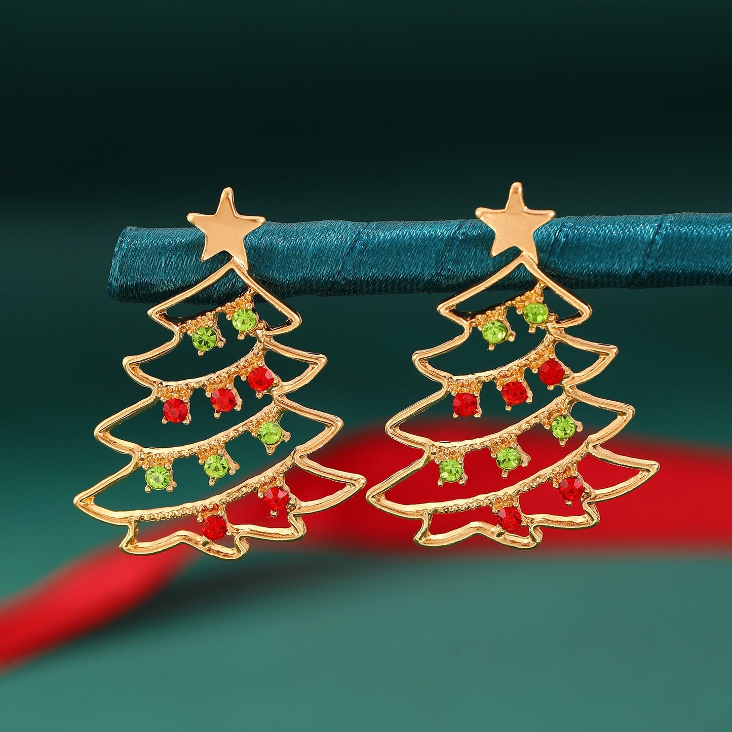 Women's earrings shaped like a Christmas tree elegant in colored zircon