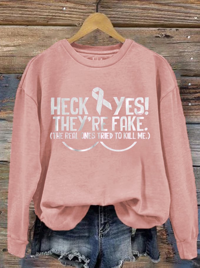 Women's Heck Yes They're Fake The Real One Tried To Kill Me Breast Cancer Awareness Print Sweatshirt